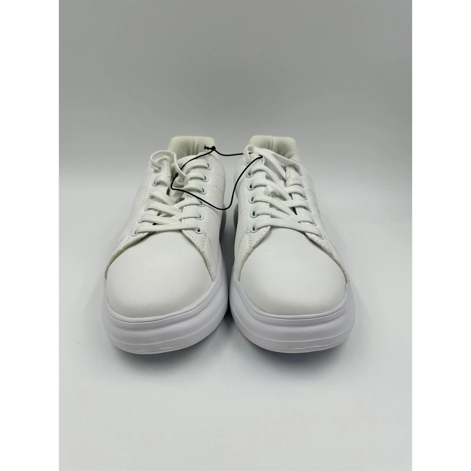 Women's Size 7, All White Synthetic Sneaker with Thick Sole for Ultimate Support