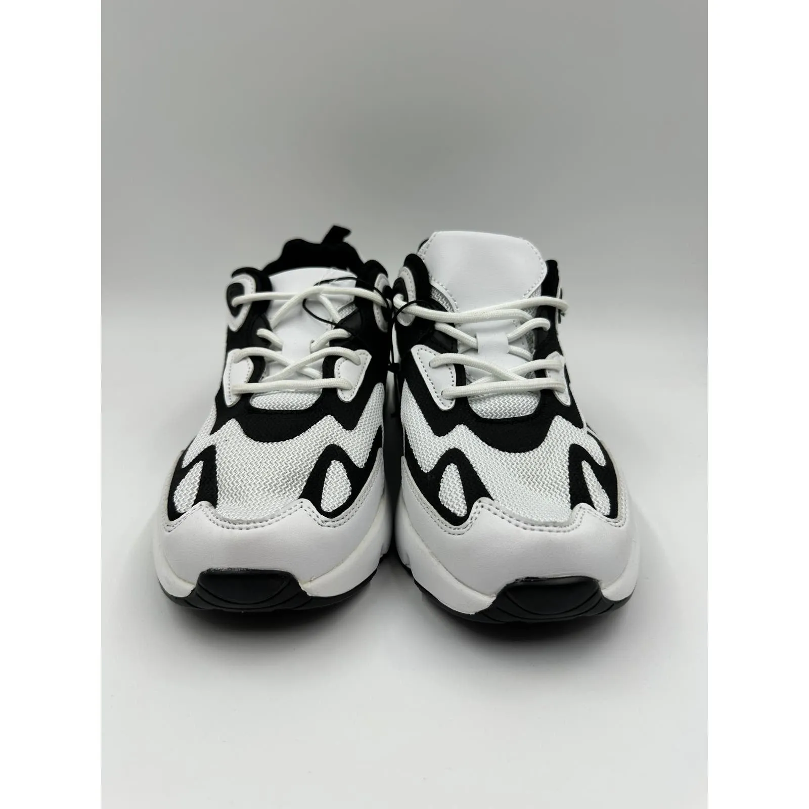 Women's Size 7, White and Black Mesh Upper with White and Black Air Heel