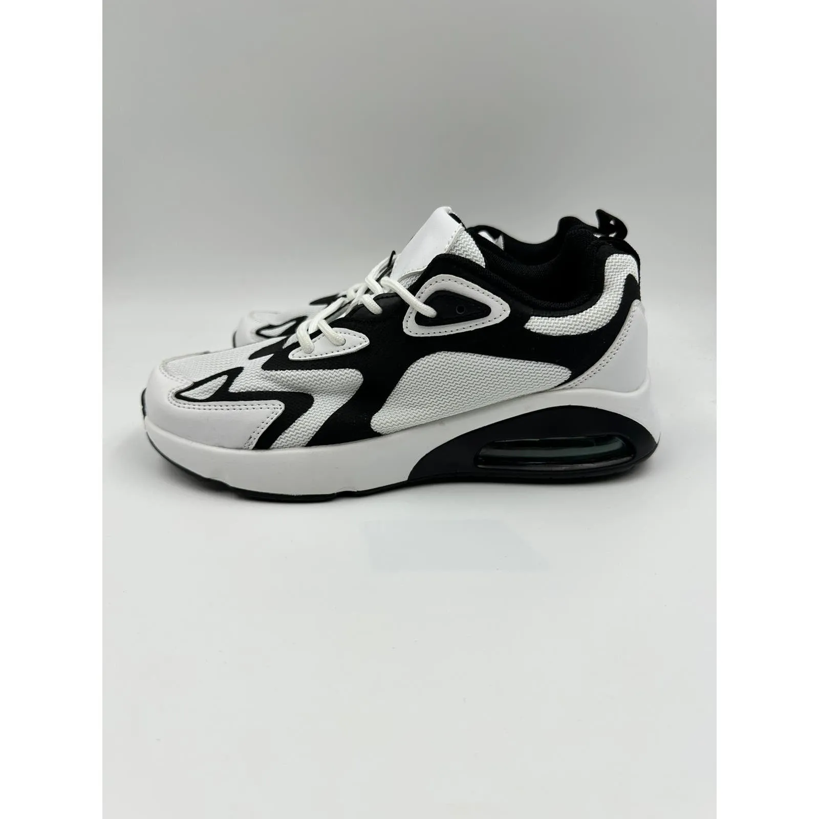 Women's Size 7, White and Black Mesh Upper with White and Black Air Heel